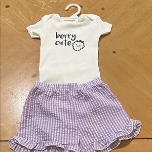 New DTF print on Carter's White Baby Onesie paired with purple shorts
